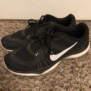 Black Nike training shoes